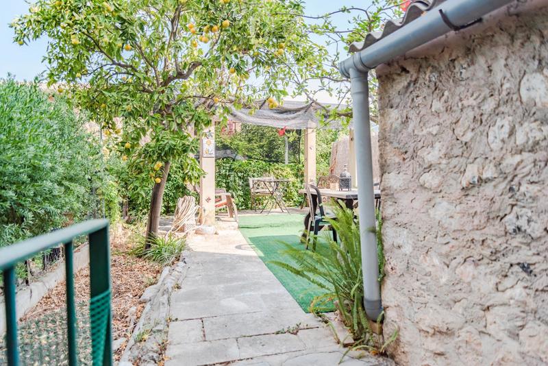 Foto 8af4e9b4-dc4f-4d73-95b9-739d47c90cb0. Semi detached house with fireplace heating in Sóller