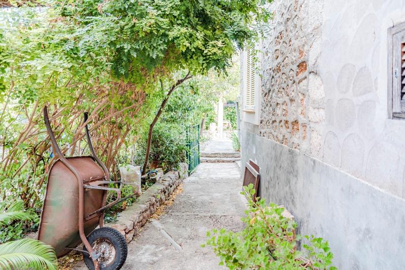 Foto a74b95bf-8a43-4cc7-847d-705255f9e744. Semi detached house with fireplace heating in Sóller