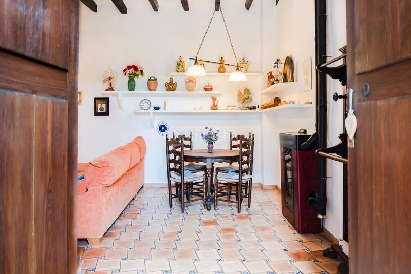 Foto f4c93906-fdaa-46de-aea2-b40dbb719ba9. Casa adossada amb xemeneia calefacció a Sóller