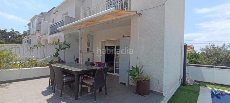 Foto abc67fa6-cd99-4e37-ba70-75cb816bc357. Casa adossada amb piscina a Coma-ruga platja Coma-ruga