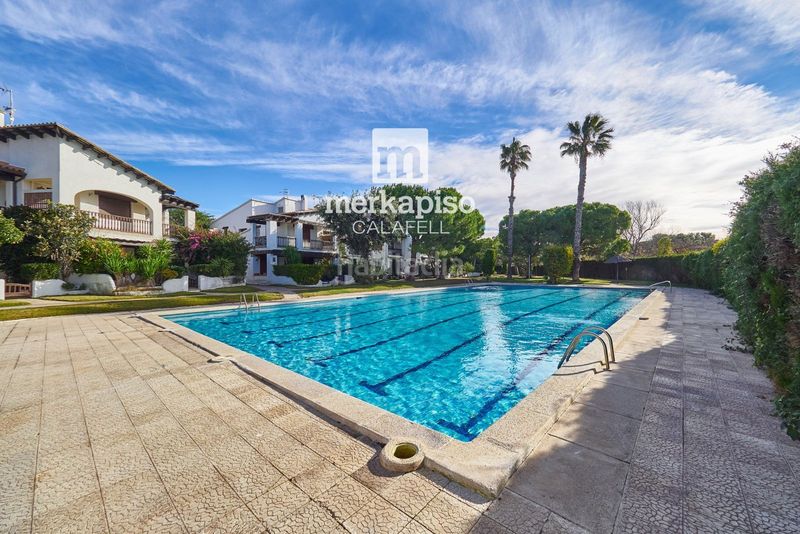 Foto 714f4361-6630-494b-89a5-6a73d17aeb1f. Casa adossada amb calefacció aparcament piscina a Calafell