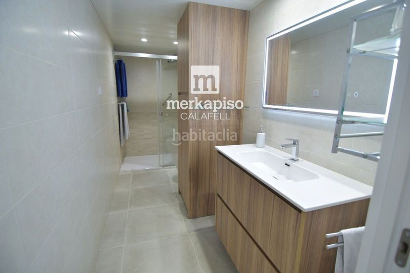 Foto 54437401-a707-4cf9-b92c-b2929df0abb3. Dúplex amb aparcament piscina a L´Estany Calafell