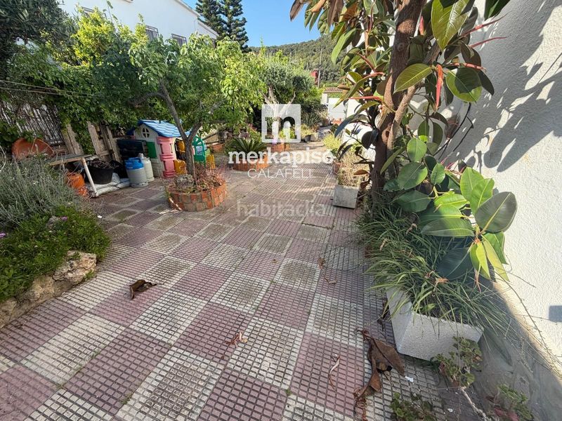 Foto f3341d8b-8d1b-45f4-b81f-126ef1344b24. Casa amb calefacció aparcament piscina a Calafell park Calafell