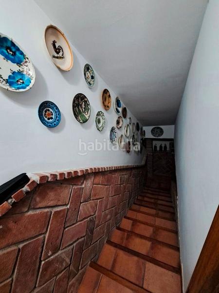 Foto 6c8f4115-d443-4076-90fa-2e7bf37dbd2b. Casa aparellada amb xemeneia calefacció aparcament piscina a Mataró