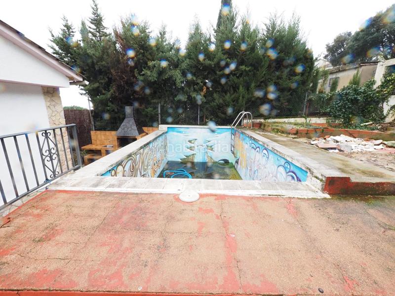 Foto 078b7ae9-2a12-45be-96ff-f9a9d7a4c11b. Casa se vende casa con piscina , urbanización roca rossa en Tordera