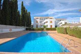 Piccolo appartamento in Riells. Apartamento con piscina comunitaria, a 500 m de la playa.