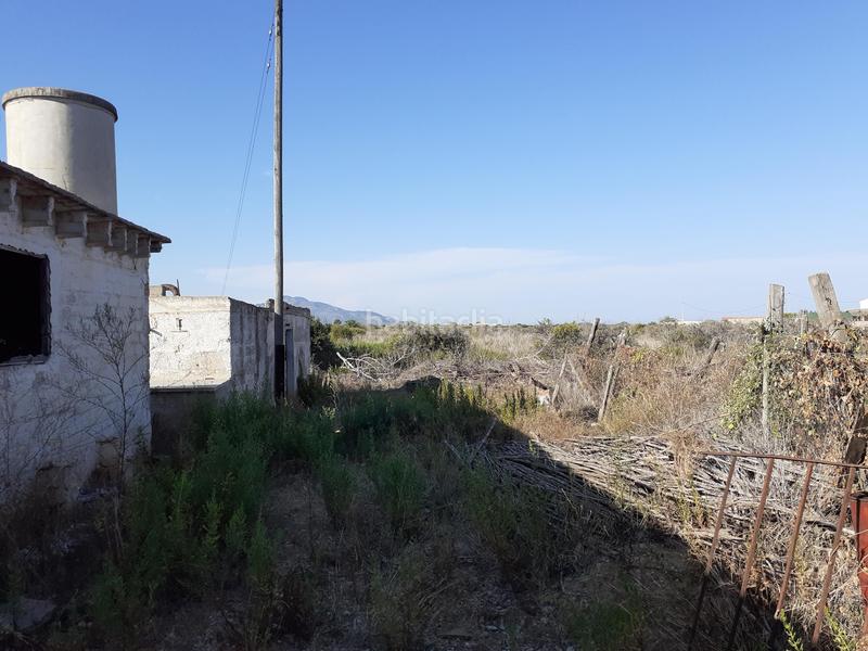 Foto 4e8c99b7-434a-47ef-830f-3e66641dcd56. Finca rústica gran finca rústica de 22.208 m2 con casa de campo para rehabilitar en Vinaròs