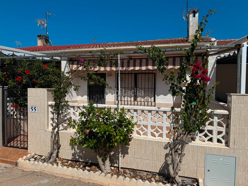 Foto 34a9904c-ce6b-46a8-b1db-ac568dd81a89. Piso iexcloportunidad uacutenica en pinomar!descubre este encantador bungalow de 45 msup2 ubicado en la prestigiosa urbanizacioacuten p en Guardamar del Segura
