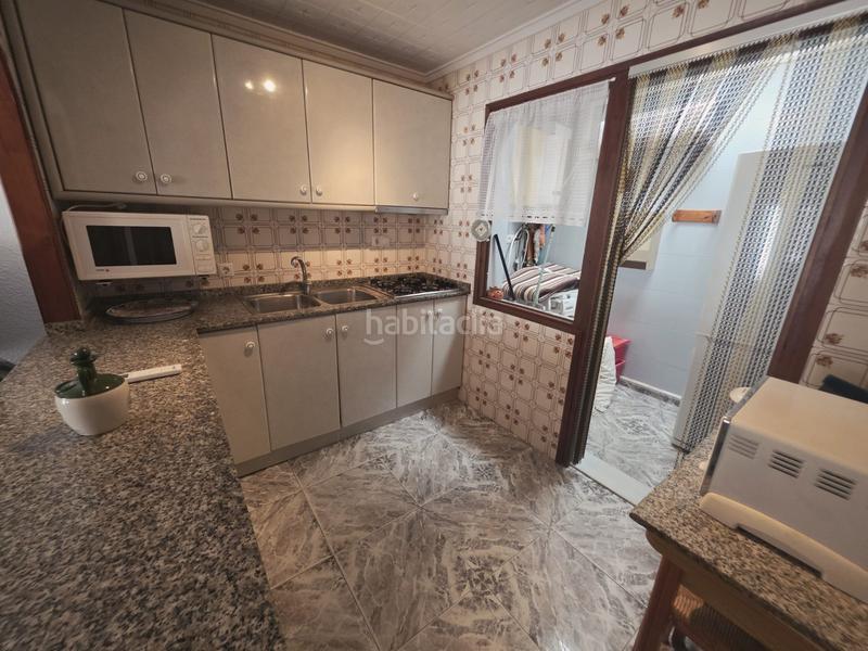 Foto dc0d47d2-c65a-4ceb-8439-8778d3fcb218. Piso iexcloportunidad uacutenica en pinomar!descubre este encantador bungalow de 45 msup2 ubicado en la prestigiosa urbanizacioacuten p en Guardamar del Segura