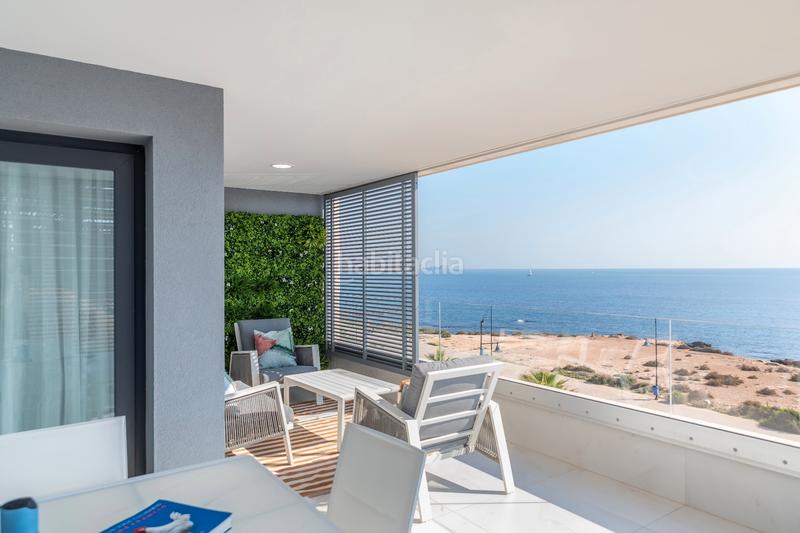Foto bd252ddd-a3e8-44ee-b48e-1455600bfd19. Appartement avec parking piscine dans Punta Prima Orihuela