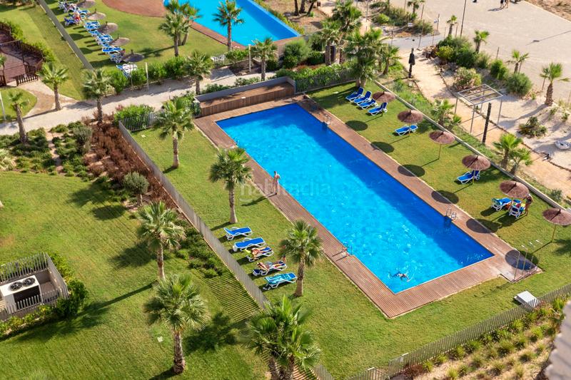 Foto ffdc79f2-6b76-4f33-97db-d1b6fb0239b3. Appartement avec parking piscine dans Punta Prima Orihuela