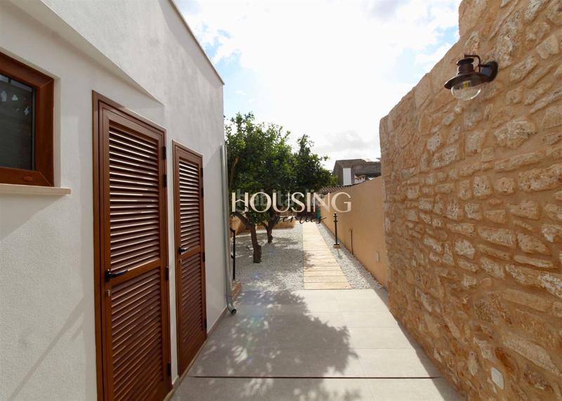 Foto fb5a5ee7-a18d-4a22-ae2a-4c071f15f600. Casa adossada amb xemeneia piscina a Llucmajor interior Llucmajor