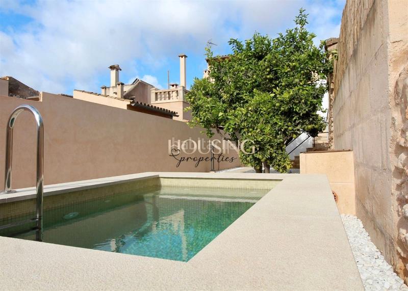 Foto 5a9ae121-2d71-4894-b687-c97726aa8ea8. Casa adossada amb xemeneia piscina a Llucmajor interior Llucmajor