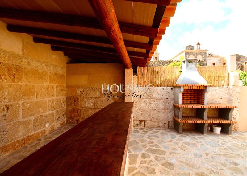 Foto dcd6d512-20f5-412b-9fc6-fd8533c25042. Casa adossada amb xemeneia piscina a Llucmajor interior Llucmajor