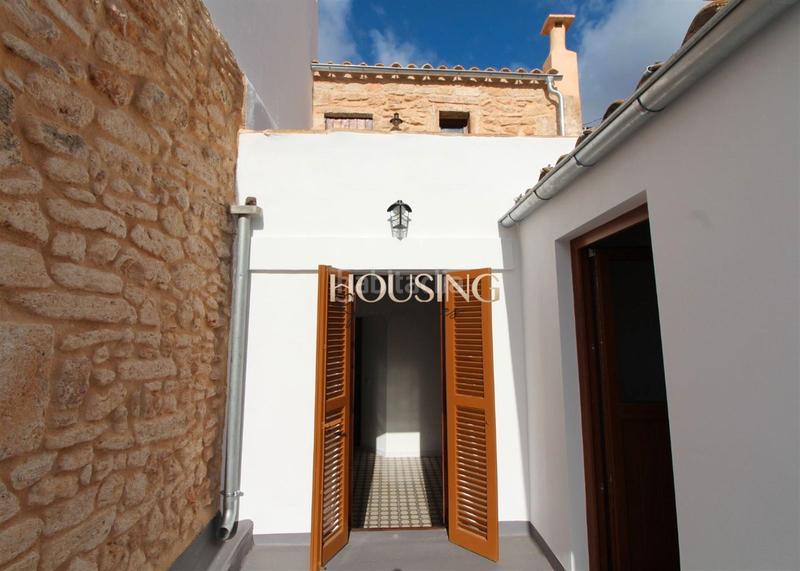 Foto e81fd476-cbc0-4386-89ce-7a767680ef79. Casa adossada amb xemeneia piscina a Llucmajor interior Llucmajor