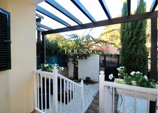 Casa adossada a Son Xigala. En residencial con piscinas y jardines