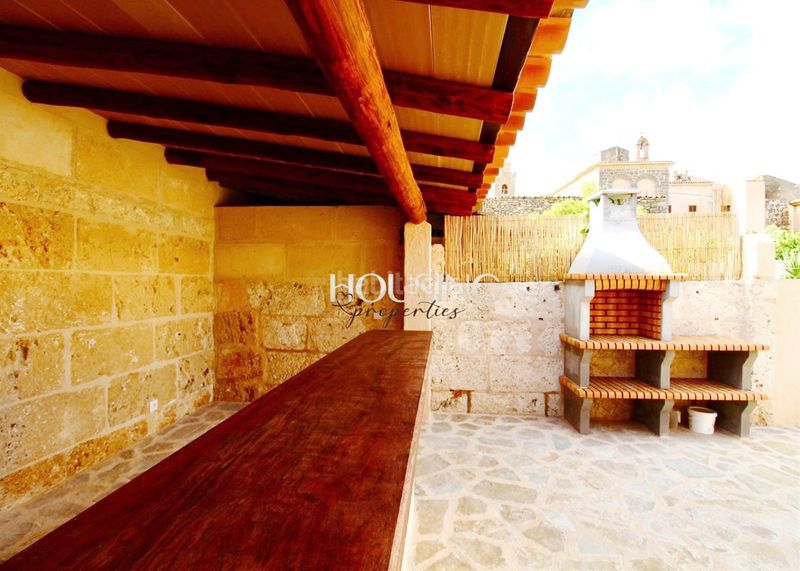 Foto 373fcc9e-999b-4a8b-8c73-2686eb1d8887. Casa adossada amb xemeneia calefacció aparcament piscina a Llucmajor