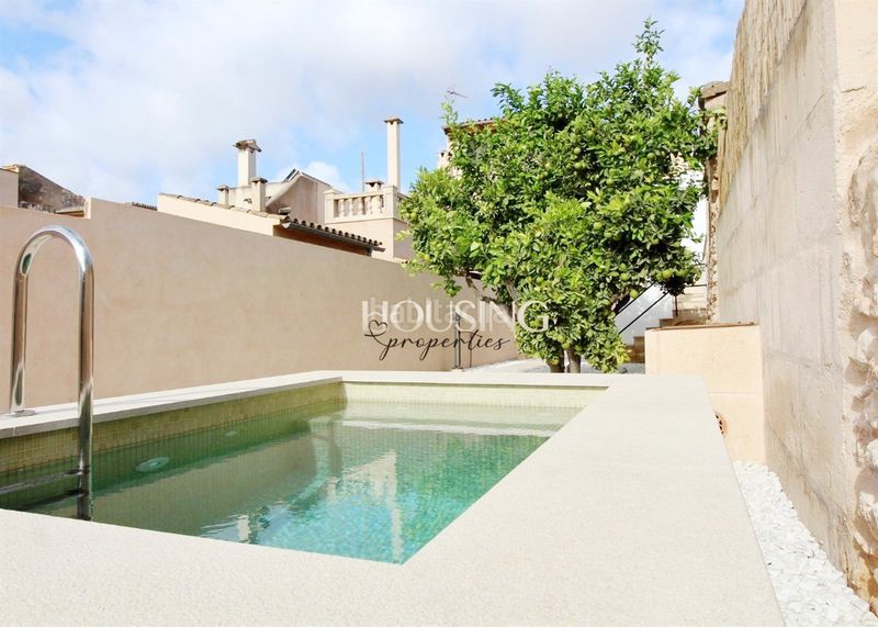 Foto f6ffe7ac-2170-404f-a585-8dac1887d937. Casa adossada amb xemeneia calefacció aparcament piscina a Llucmajor