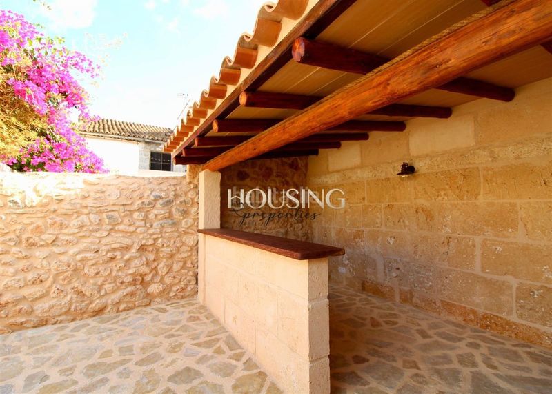 Foto bc4f9a8d-1963-4521-8561-46184aac9ae0. Casa adossada amb xemeneia calefacció aparcament piscina a Llucmajor