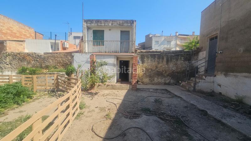 Foto 508809d2-3dd3-4de2-a4e1-790d379e79ff. Casa adosada casa+patio+almacén+calig+costa azahar+españa en Cálig