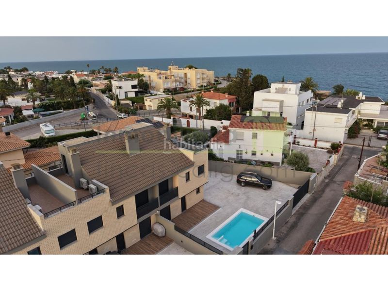 Foto bdd88ebf-2e47-47d6-9507-4f43b6a5d948. Casa adossada amb aparcament piscina a Costa Norte Vinaròs