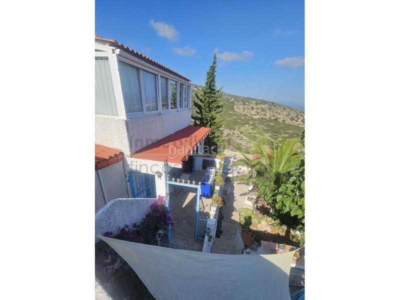 Foto 7bad9afc-a348-465a-9d38-50d7d404cdc0. Casa amb aparcament piscina a Las Atalayas-Urmi-Cerro Mar Peñíscola