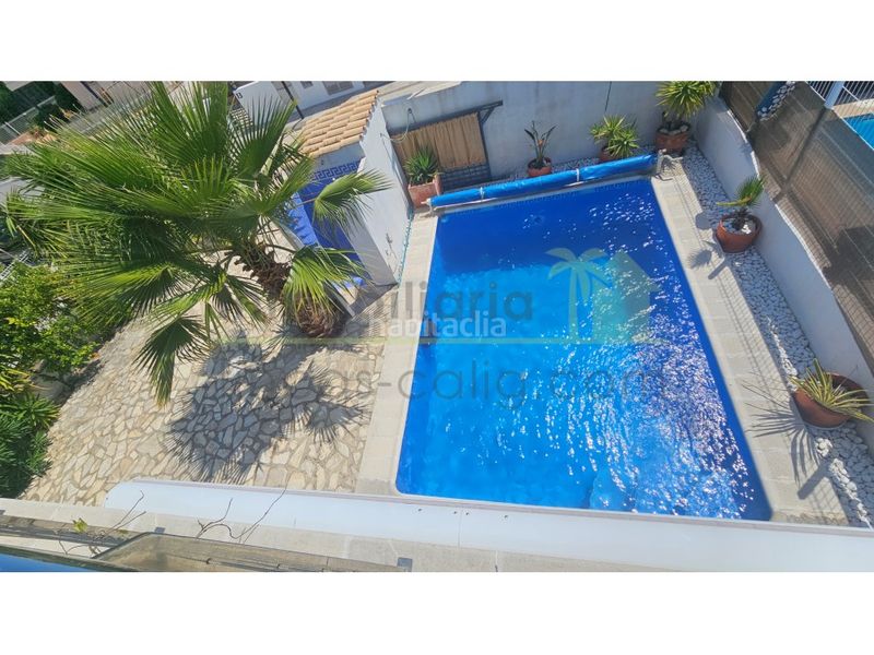 Foto 06a7b7cd-67db-4ed9-8220-5a4d0fc50ee9. Casa amb aparcament piscina a Las Atalayas-Urmi-Cerro Mar Peñíscola