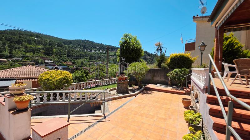 Foto f44ee21a-2feb-46cf-8056-83ab041d1c90. Casa amb xemeneia calefacció aparcament a Vallirana