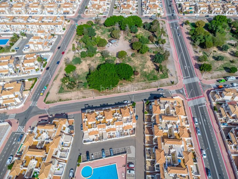 Foto 0a480218-443c-4740-8ed5-0e4a1dc93910. Duplex avec chauffage parking piscine dans Aguas Nuevas Torrevieja