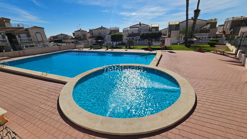 Foto f6aa26fb-1111-4939-977c-0371b43c0e9b. Duplex avec chauffage parking piscine dans Aguas Nuevas Torrevieja