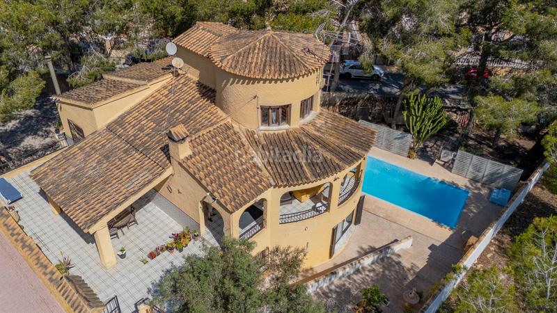 Foto 83a0676c-9ed7-4f0b-ae57-5e1ed3eb79d6. Chalet with parking pool in Villamartín-Las Filipinas Orihuela