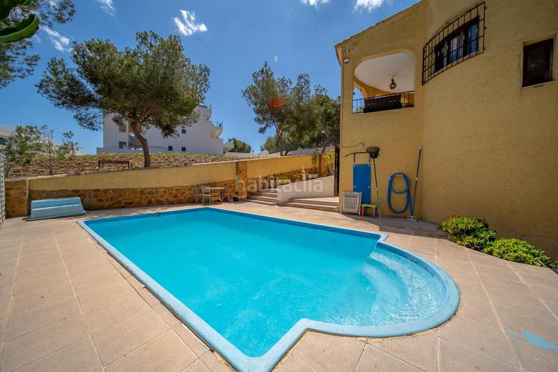 Foto 8f66bf0f-0cd0-495b-991b-9980e0c58754. Chalet with parking pool in Villamartín-Las Filipinas Orihuela