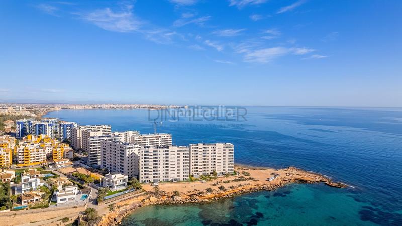 Foto 8ab04aa5-edad-40c4-82d1-31549e63c2a8. Apartment with parking pool in Punta Prima Torrevieja
