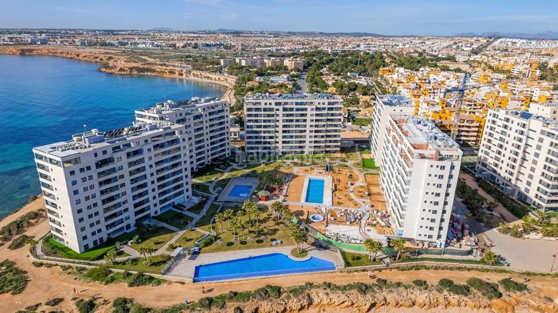 Foto 6bae327f-56f2-40d2-b2db-eee562f436ac. Appartement mit parking pool in Punta Prima Torrevieja