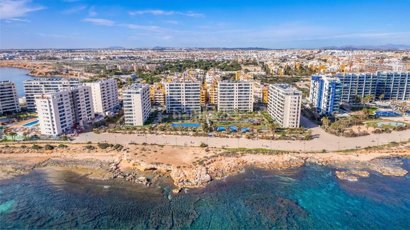 Foto d698daa1-7f5b-46f6-8f95-acce04546c0e. Appartement mit parking pool in Punta Prima Torrevieja