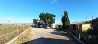 Terreny residencial a El Altet. Venta de terreno con nave almacenen el altet