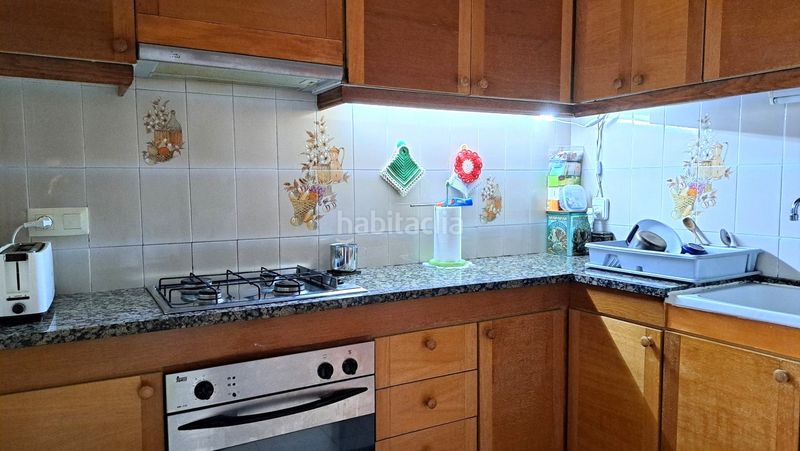 Foto 0d3c362b-384f-434a-a461-6d25f0cc7d20. Casa adossada amb xemeneia calefacció aparcament a Cunit