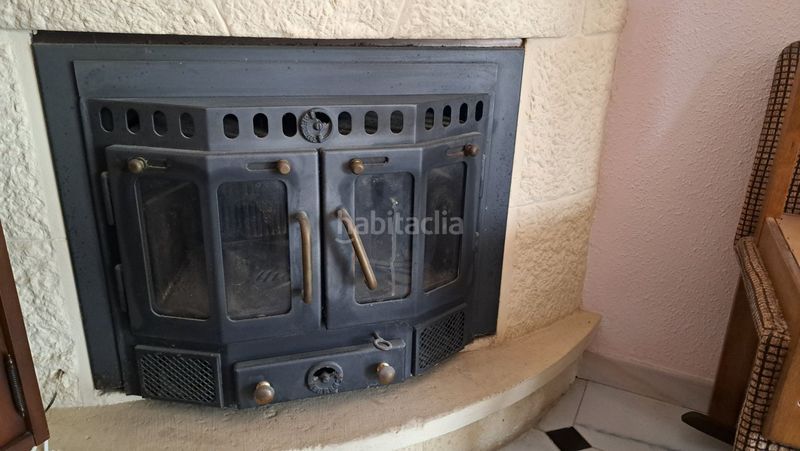 Foto 6958bb35-3175-4f76-adb3-a279b029f66e. Casa adossada amb xemeneia calefacció aparcament a Cunit