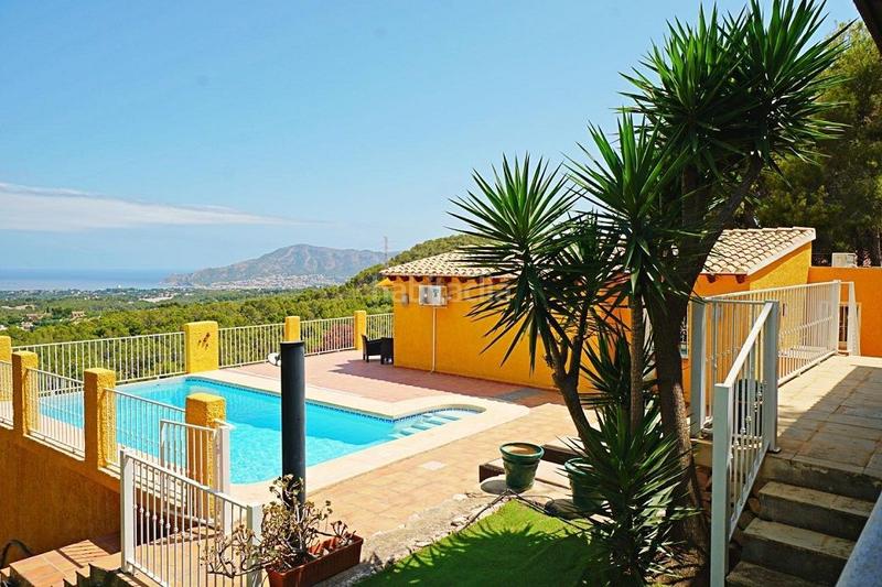 Foto 7f123cb7-2466-4cea-89a2-5d8e1c3ff7f0. Casa encantador chalet en bello horizonte con vistas inigualables al mar en Nucia (la)