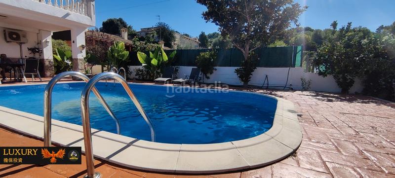 Foto 61d68ee4-18cb-4835-9d73-18e3366812c9. Chalet with fireplace heating parking pool in costa Cunit - els jardins - els rosers Cunit