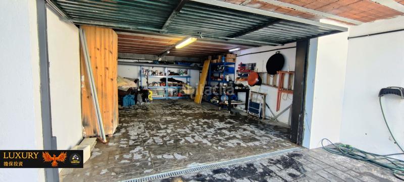 Foto b60ca9dd-2327-4b2b-8f42-e3edc42ee7eb. Chalet with fireplace heating parking pool in costa Cunit - els jardins - els rosers Cunit