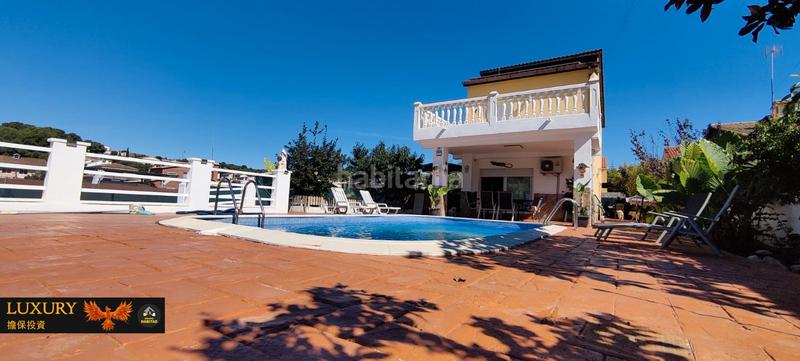 Foto c0e238ca-b66d-4660-8082-371af2f8bc20. Chalet with fireplace heating parking pool in costa Cunit - els jardins - els rosers Cunit