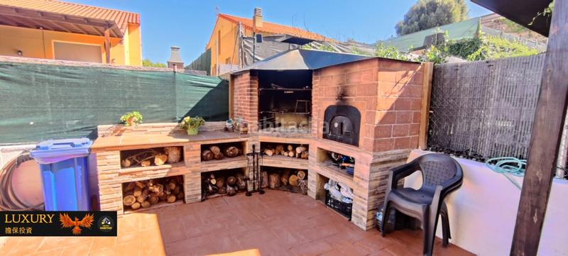 Foto d9eacd16-d927-4485-93f1-496918df76b1. Chalet with fireplace heating parking pool in costa Cunit - els jardins - els rosers Cunit