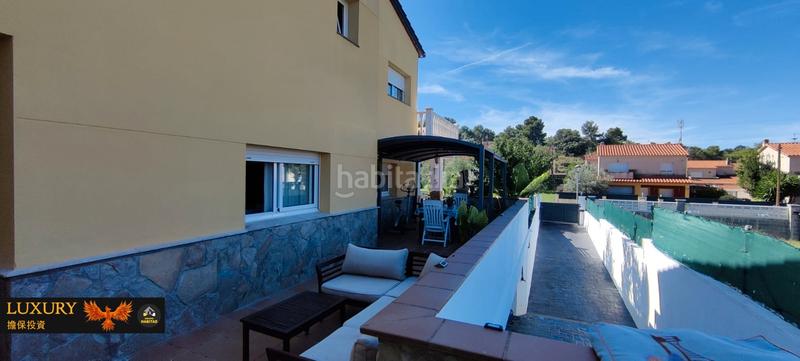 Foto f34dec3e-ca3b-4d49-ba79-7bfe13400d34. Chalet with fireplace heating parking pool in costa Cunit - els jardins - els rosers Cunit