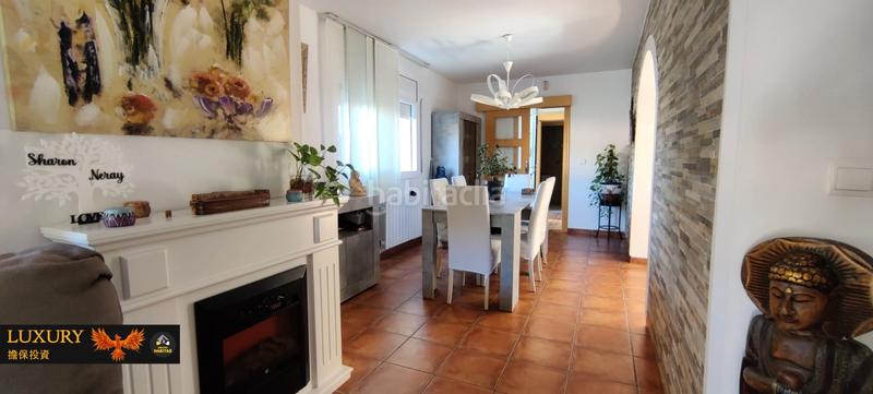 Foto f6e39799-b0b3-4608-91b7-4ed9b8cfd7a0. Chalet with fireplace heating parking pool in costa Cunit - els jardins - els rosers Cunit