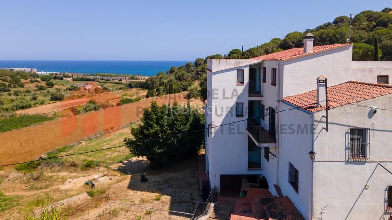 Foto eea0cd21-be33-4978-8c64-0bef55cca9b8. Casa amb aparcament a Cinc Sènies Mataró