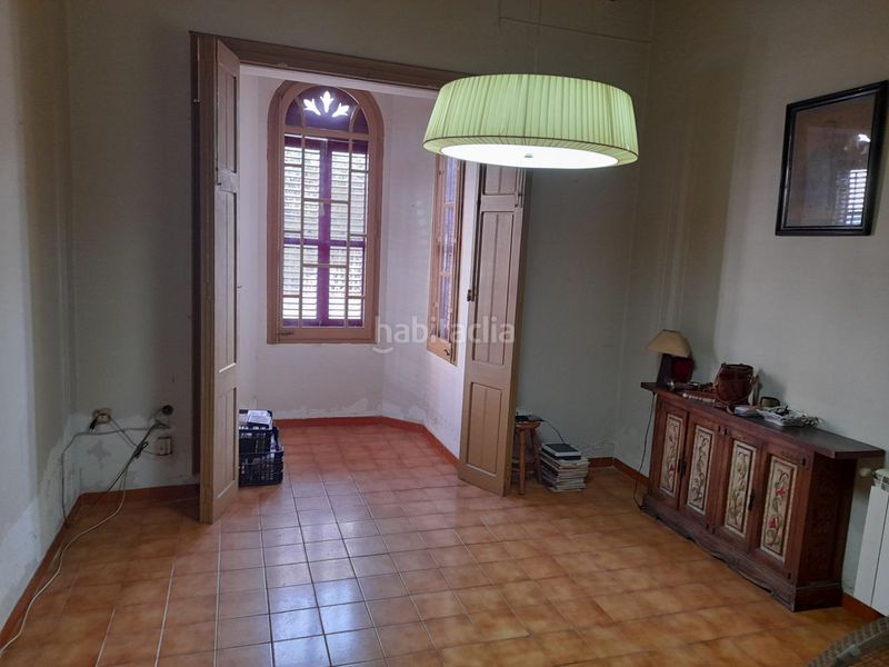 Foto f9545563-be2f-4aea-921d-1d9bc82801cd. Casa amb aparcament a Eixample Mataró