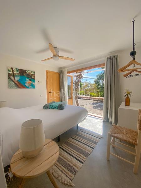 Foto 6914e4c3-7dd2-4012-8b4e-bba495bc584b. Masia amb xemeneia calefacció aparcament piscina a Sant Josep de sa Talaia