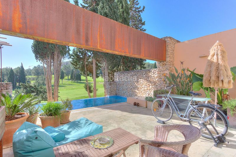 Foto 44d1c591-4db3-4d08-aeb8-83fa96c70a45. Casa aparellada amb calefacció aparcament piscina a Santa Eulària