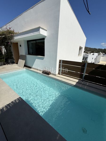 Foto 31a1de0d-1494-463c-b90a-506f6162d67b. Casa aparellada amb calefacció aparcament piscina a Santa Eulària